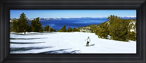 Framed Tourist skiing in a ski resort, Heavenly Mountain Resort, Lake Tahoe, California-Nevada Border, USA Print