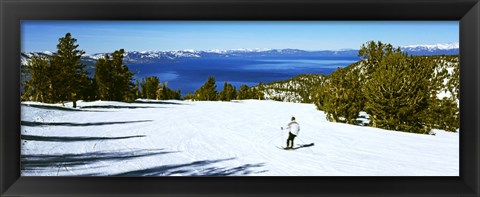 Framed Tourist skiing in a ski resort, Heavenly Mountain Resort, Lake Tahoe, California-Nevada Border, USA Print