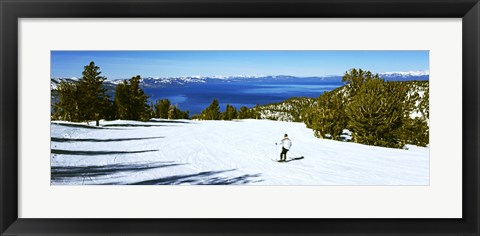 Framed Tourist skiing in a ski resort, Heavenly Mountain Resort, Lake Tahoe, California-Nevada Border, USA Print