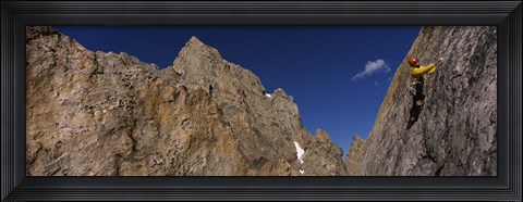 Framed Man climbing up a mountain, Grand Teton, Grand Teton National Park, Wyoming, USA Print