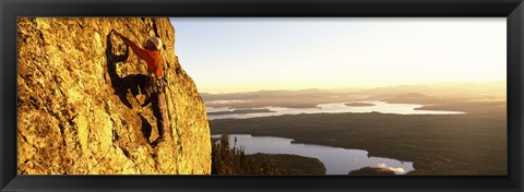 Framed Man climbing up a mountain, Rockchuck Peak, Grand Teton National Park, Wyoming, USA Print