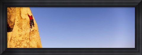 Framed Rear view of a woman climbing a mountain, Joshua Tree National Park, California, USA Print