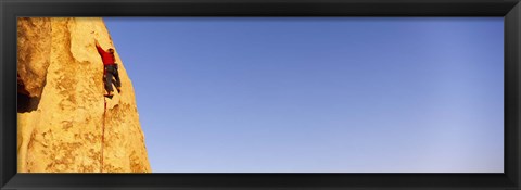 Framed Rear view of a woman climbing a mountain, Joshua Tree National Park, California, USA Print