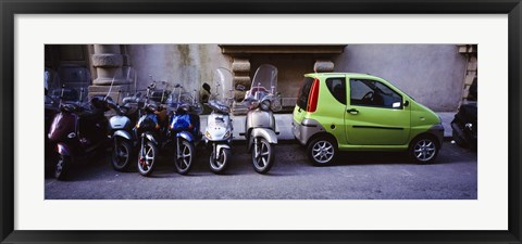 Framed Motor scooters with a car parked in a street, Florence, Italy Print