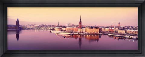 Framed Reflection of buildings in a lake, Lake Malaren, Riddarholmen, Gamla Stan, Stockholm, Sweden Print