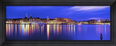 Framed Buildings at the waterfront lit up at dusk, Stockholm, Sweden Print