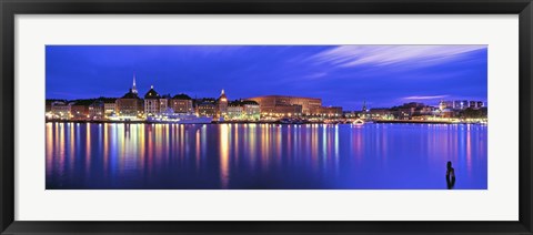 Framed Buildings at the waterfront lit up at dusk, Stockholm, Sweden Print