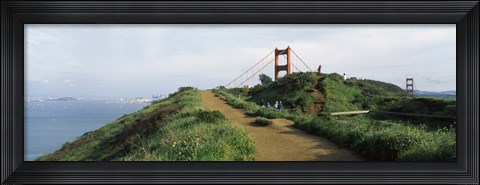 Framed Path leading towards a suspension bridge, Golden Gate Bridge, San Francisco, California, USA Print