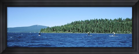 Framed Tourists paddle boarding in a lake, Lake Tahoe, California, USA Print