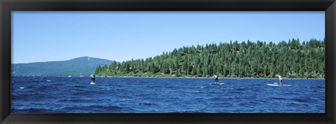 Framed Tourists paddle boarding in a lake, Lake Tahoe, California, USA Print