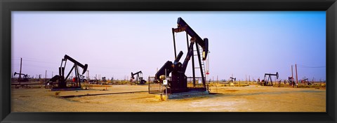 Framed Oil wells in oil field, California State Route 46, California, USA Print