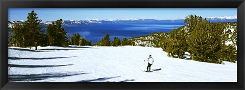 Framed Tourist skiing in a ski resort, Heavenly Mountain Resort, Lake Tahoe, California-Nevada Border, USA Print