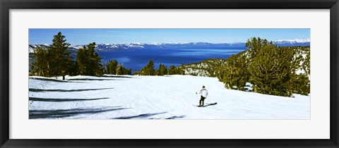 Framed Tourist skiing in a ski resort, Heavenly Mountain Resort, Lake Tahoe, California-Nevada Border, USA Print