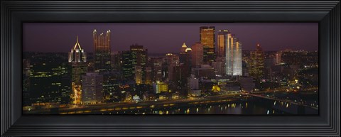 Framed High angle view of buildings lit up at night, Pittsburgh, Pennsylvania, USA Print
