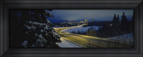 Framed Winding road running through a snow covered landscape, Anchorage, Alaska, USA Print