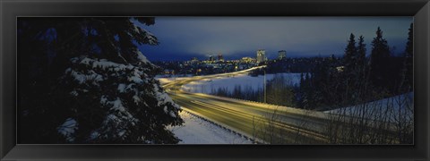 Framed Winding road running through a snow covered landscape, Anchorage, Alaska, USA Print