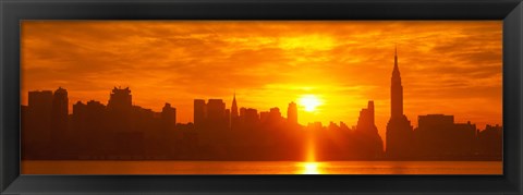 Framed Birght Orange Sky and Sun Behind the New York City Skyline Print