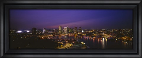 Framed Aerial view of a city lit up at dusk, Baltimore, Maryland, USA Print