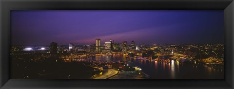 Framed Aerial view of a city lit up at dusk, Baltimore, Maryland, USA Print