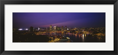 Framed Aerial view of a city lit up at dusk, Baltimore, Maryland, USA Print