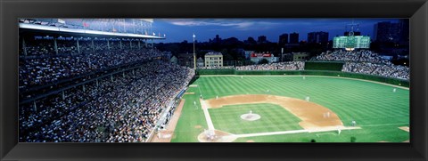 Framed Cubs baseball game under flood lights, USA, Illinois, Chicago Print