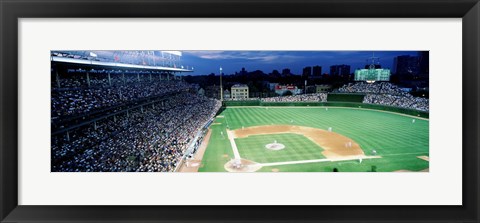 Framed Cubs baseball game under flood lights, USA, Illinois, Chicago Print