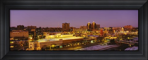 Framed High angle view of buildings lit up at dusk, Kansas City, Missouri, USA Print