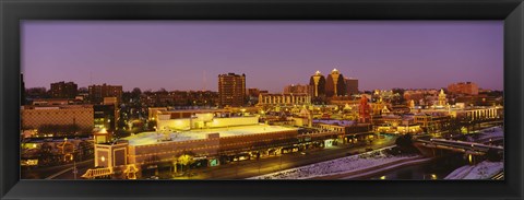 Framed High angle view of buildings lit up at dusk, Kansas City, Missouri, USA Print