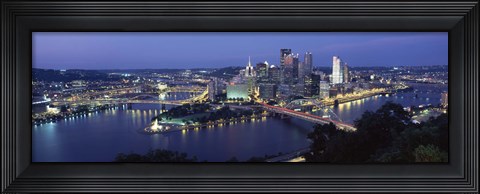Framed Buildings along a river lit up at dusk, Monongahela River, Pittsburgh, Allegheny County, Pennsylvania, USA Print