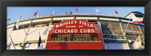 Framed Red score board outside Wrigley Field,USA, Illinois, Chicago Print