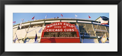 Framed Red score board outside Wrigley Field,USA, Illinois, Chicago Print