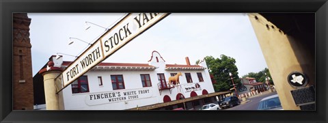 Framed Low angle view of a commercial signboard, Fort Worth Stockyards, Fort Worth, Texas, USA Print