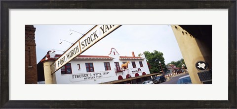 Framed Low angle view of a commercial signboard, Fort Worth Stockyards, Fort Worth, Texas, USA Print