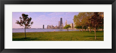 Framed Trees in a park with lake and buildings in the background, Lincoln Park, Lake Michigan, Chicago, Illinois, USA Print