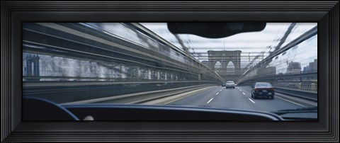Framed Cars moving on the bridge, Brooklyn Bridge, New York City, New York State, USA Print