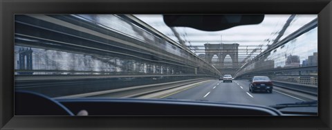 Framed Cars moving on the bridge, Brooklyn Bridge, New York City, New York State, USA Print