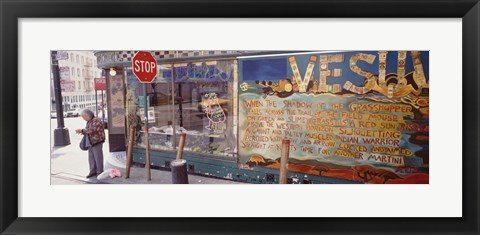 Framed USA, California, San Francisco, Little Italy, Senior man standing outside a bar Print
