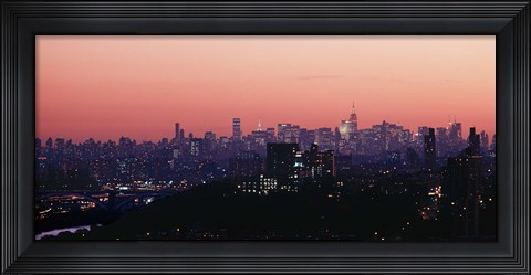 Framed High angle view of buildings lit up at dusk, Manhattan, New York City, New York State, USA Print