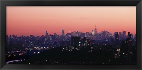 Framed High angle view of buildings lit up at dusk, Manhattan, New York City, New York State, USA Print