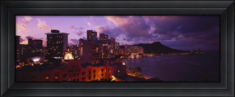 Framed Buildings lit up at dusk, Waikiki, Oahu, Hawaii, USA Print