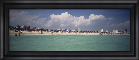 Framed Tourists on the beach, Miami, Florida, USA Print
