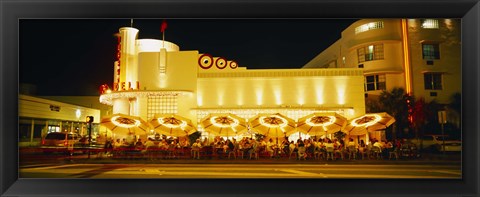 Framed Restaurant lit up at night, Miami, Florida, USA Print