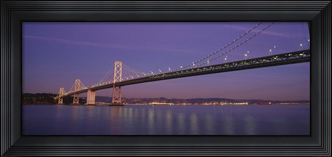 Framed Low angle view of a bridge at dusk, Oakland Bay Bridge, San Francisco, California, USA Print
