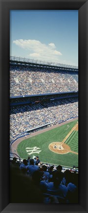 Framed High angle view of spectators watching a baseball match in a stadium, Yankee Stadium, New York City, New York State, USA Print