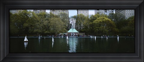 Framed Toy boats floating on water, Central Park, Manhattan Print