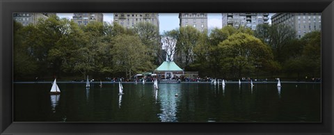 Framed Toy boats floating on water, Central Park, Manhattan Print