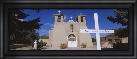 Framed Cross in front of a church, San Francisco de Asis Church, Ranchos De Taos, New Mexico, USA Print