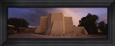 Framed Overcast clouds sky over a church, San Francisco de Asis Church, Ranchos De Taos, New Mexico, USA Print