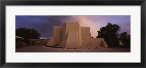 Framed Overcast clouds sky over a church, San Francisco de Asis Church, Ranchos De Taos, New Mexico, USA Print