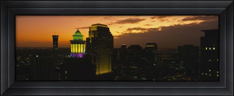 Framed High angle view of buildings lit up at dusk, New Orleans, Louisiana, USA Print